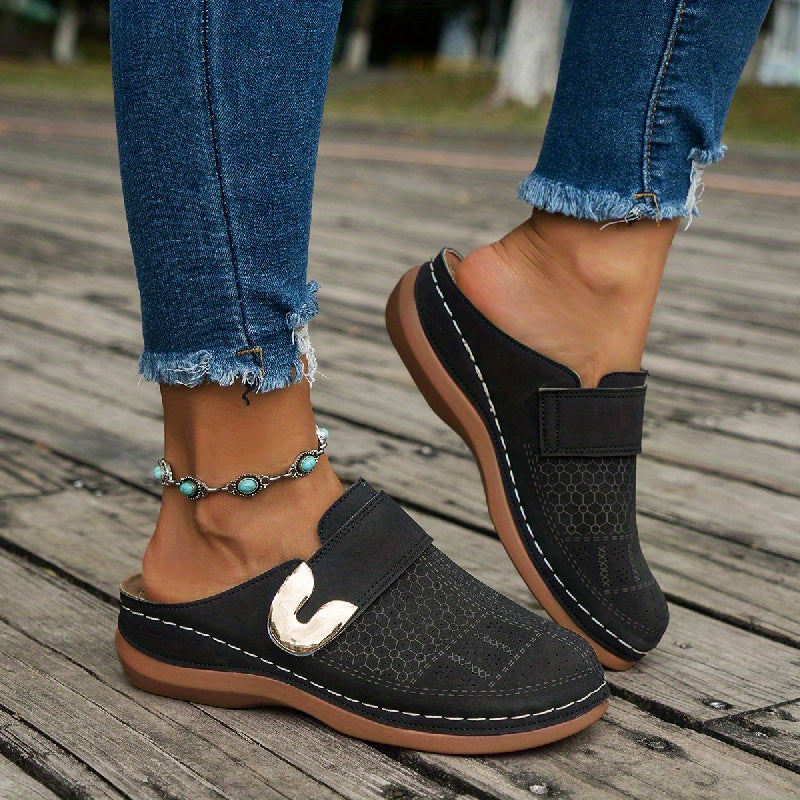 Women's closed toe mules Annabelle in Black – worn side view