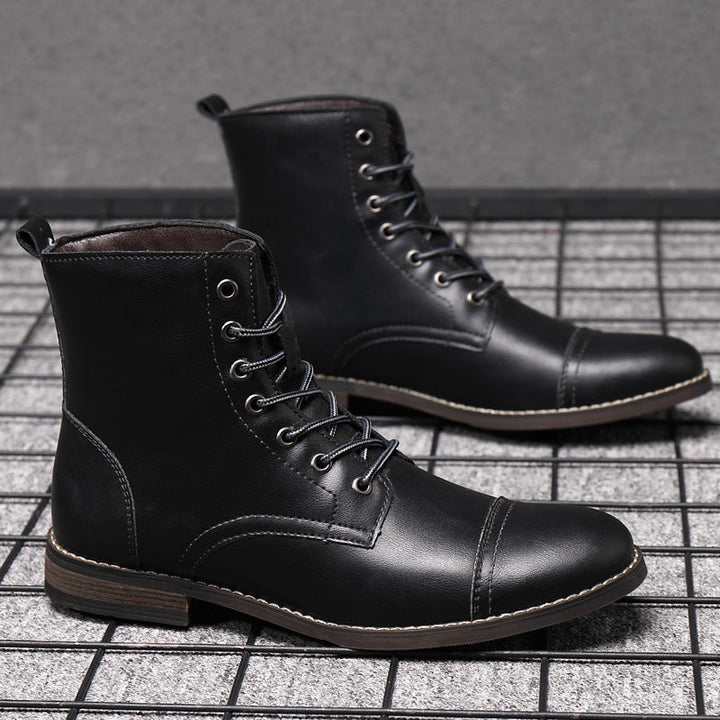 Men's toe-cap lace-up boots Christian in Deep Black – pair on grid floor