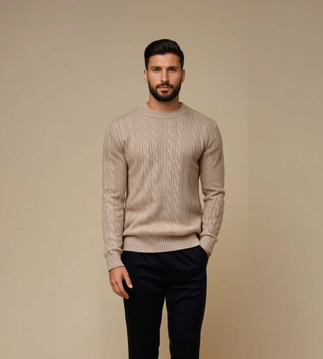 Men's beige cable knit crew neck jumper – worn by model, front view