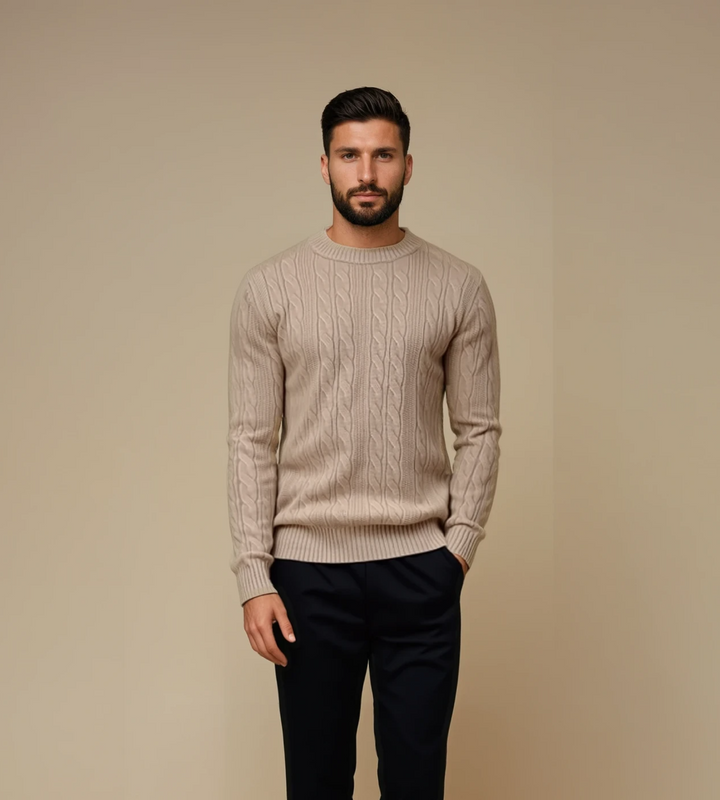 Men's beige cable knit crew neck jumper – worn by model, front view