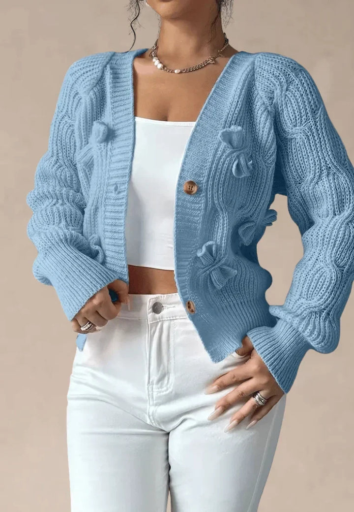 Bute women's cable knit cardigan in Light Blue – front view