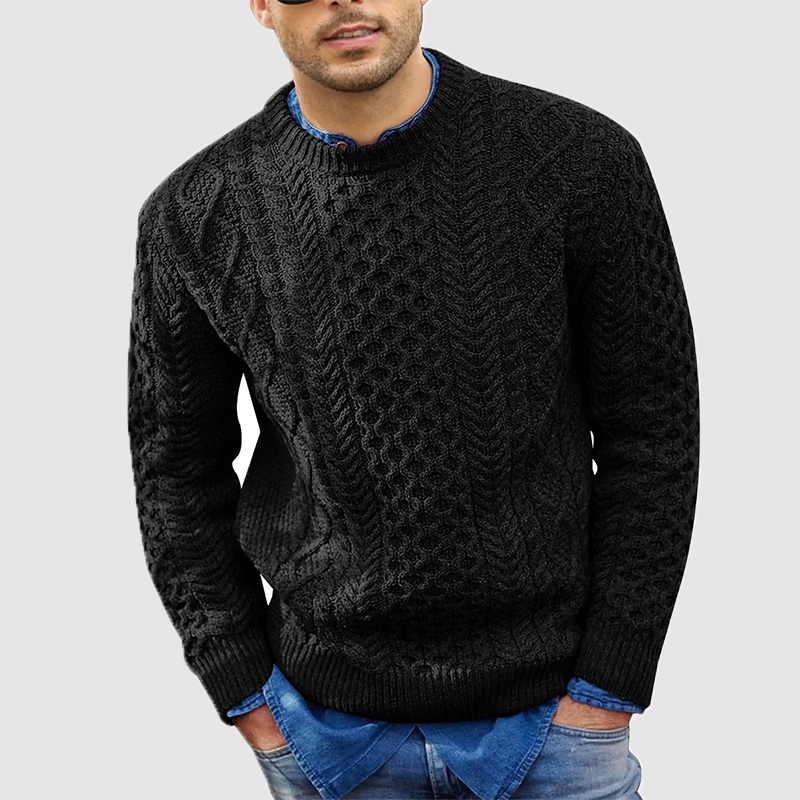 Men's cable knit crew neck jumper Zevran in Black – front view worn over a denim shirt
