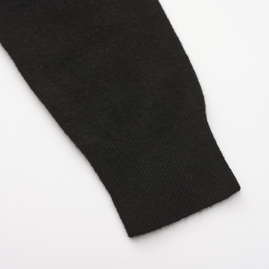 Men's soft knit polo jumper Ferris in Black – close-up of ribbed cuff