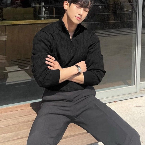 Men's cable knit half zip jumper in black – Paxton – seated view
