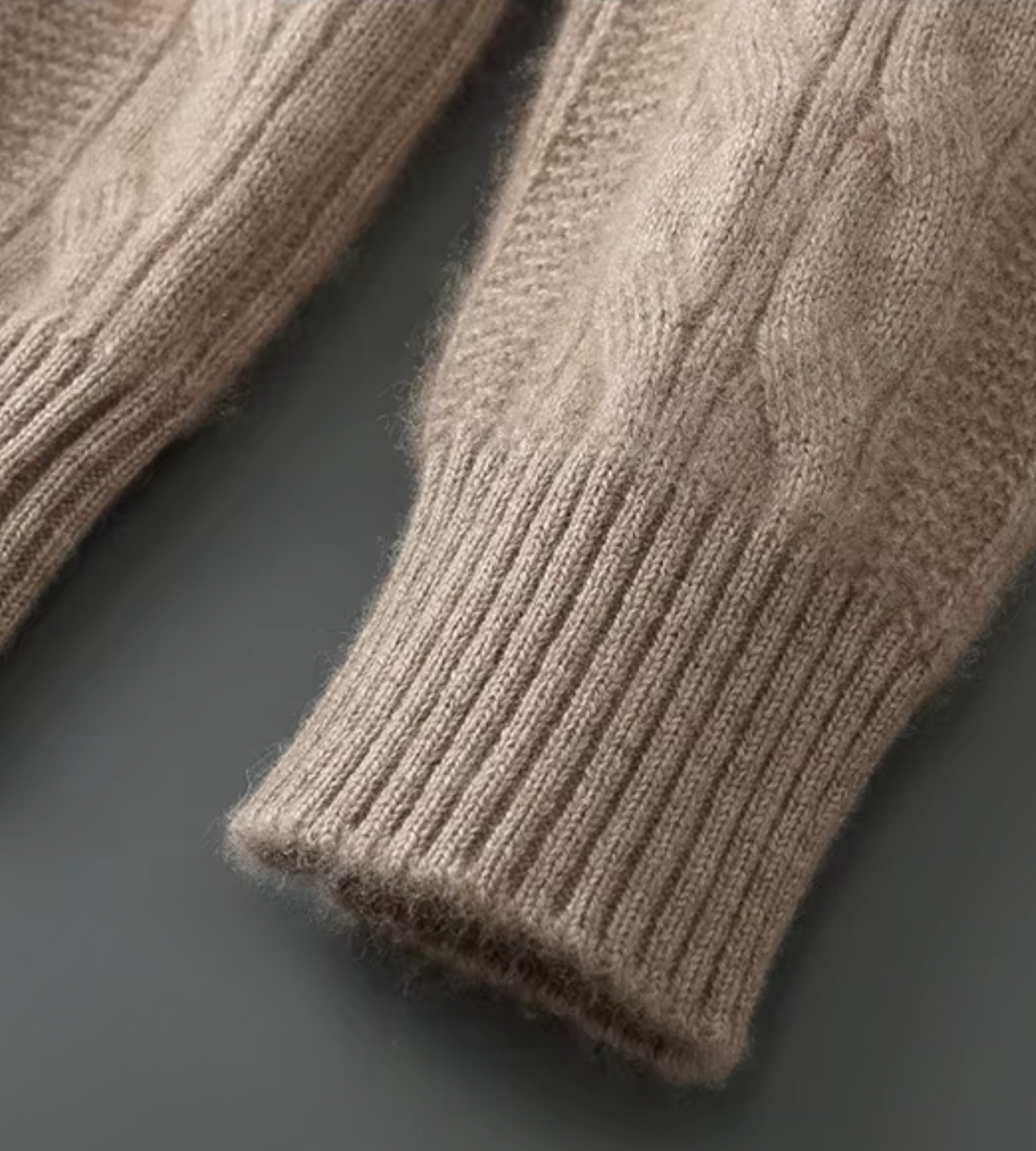 Dark beige cable knit jumper – close-up of ribbed cuff
