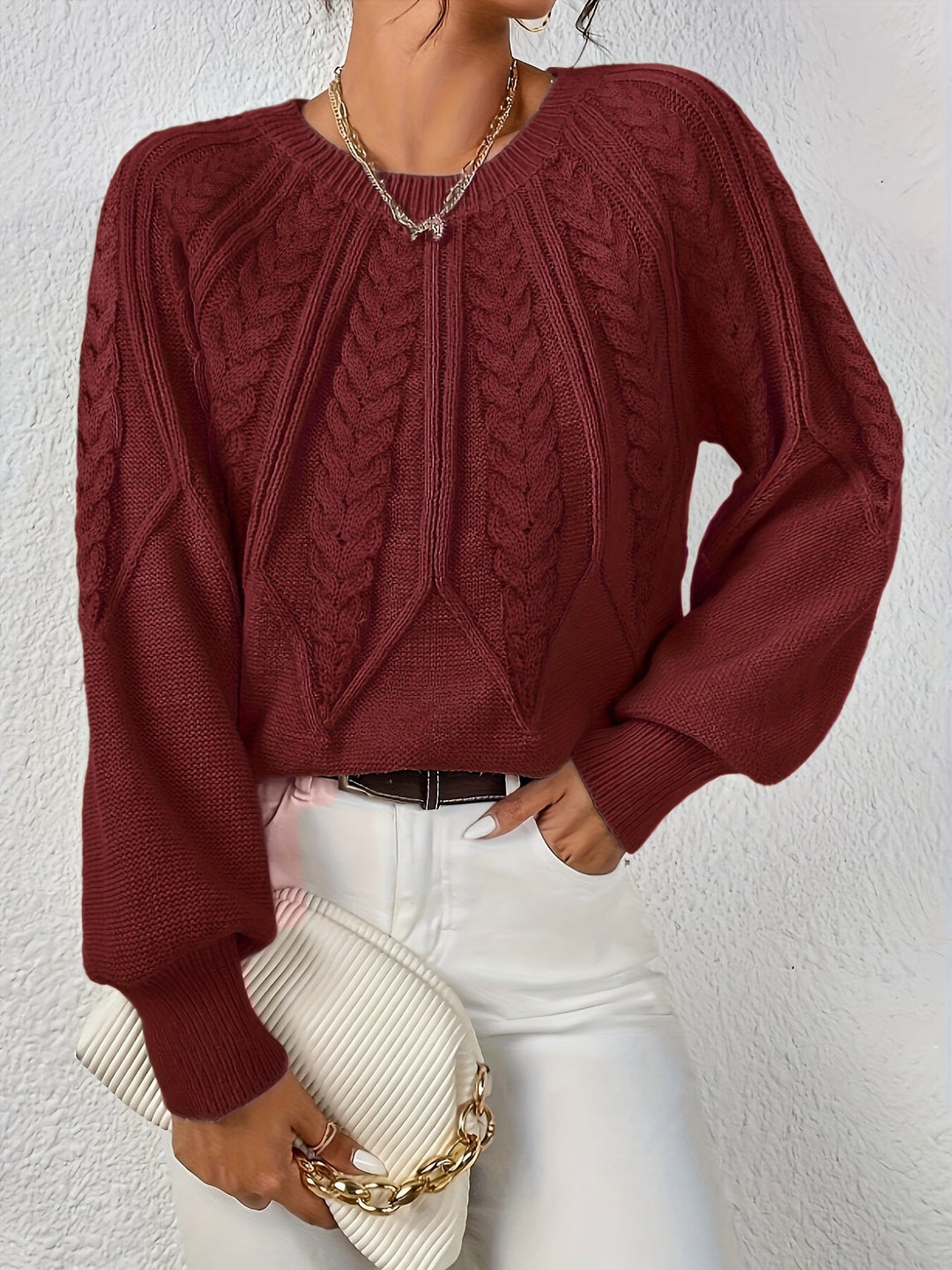 Women's cable knit jumper Ulla in Burgundy – model view with clutch