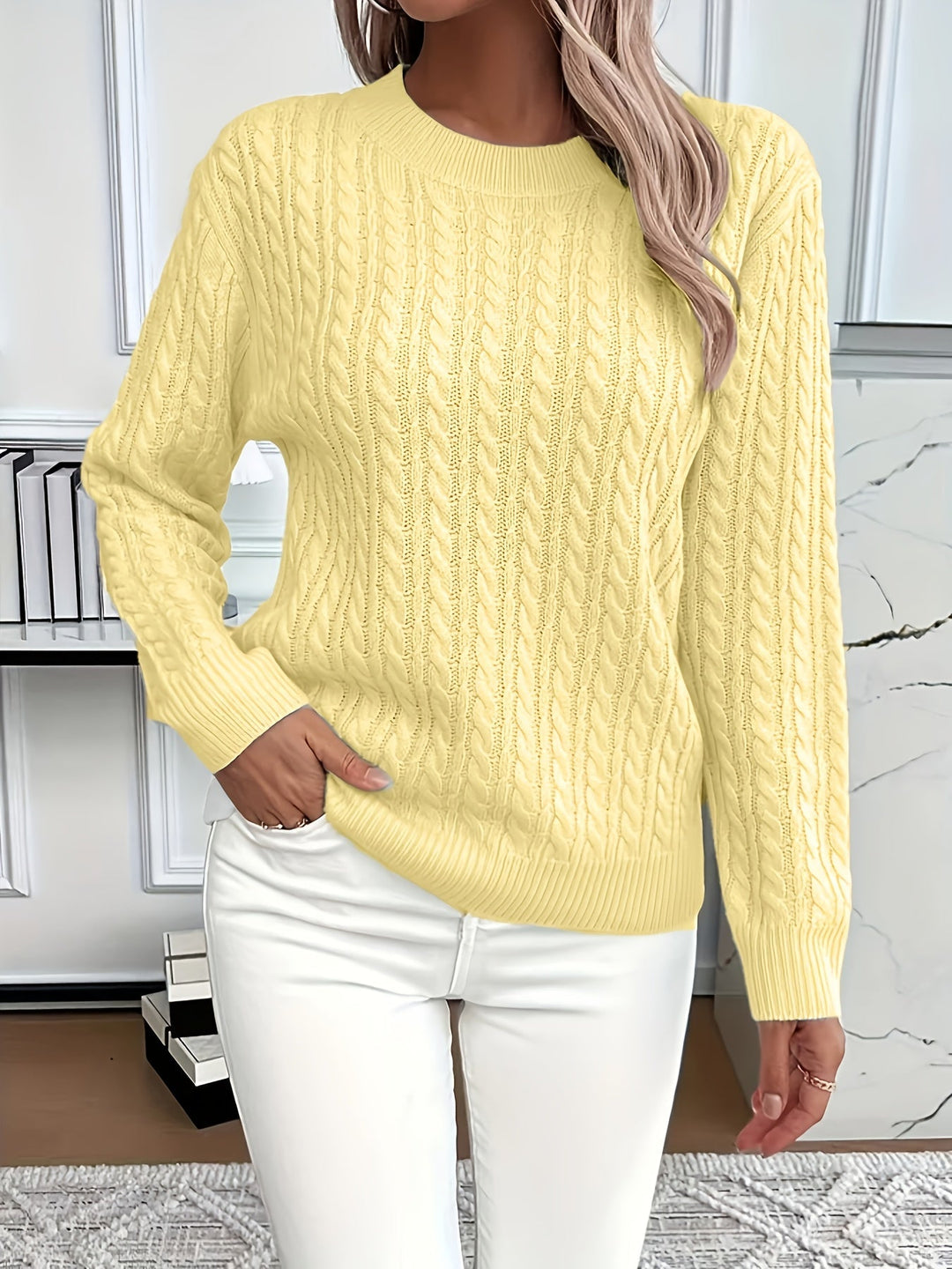 Women's cable knit jumper Rosalina in Yellow – front view hand in pocket