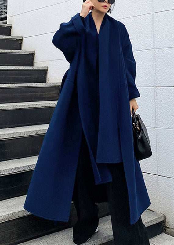 Women's maxi scarf coat Dolly in Navy Blue – walking down stairs
