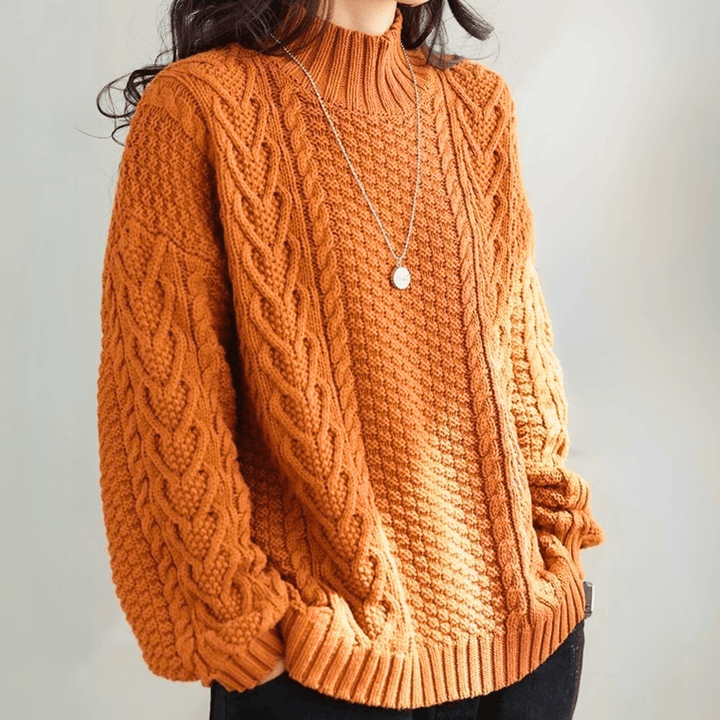 Gail - Women's chunky cable knit mock neck jumper in Rust – front view