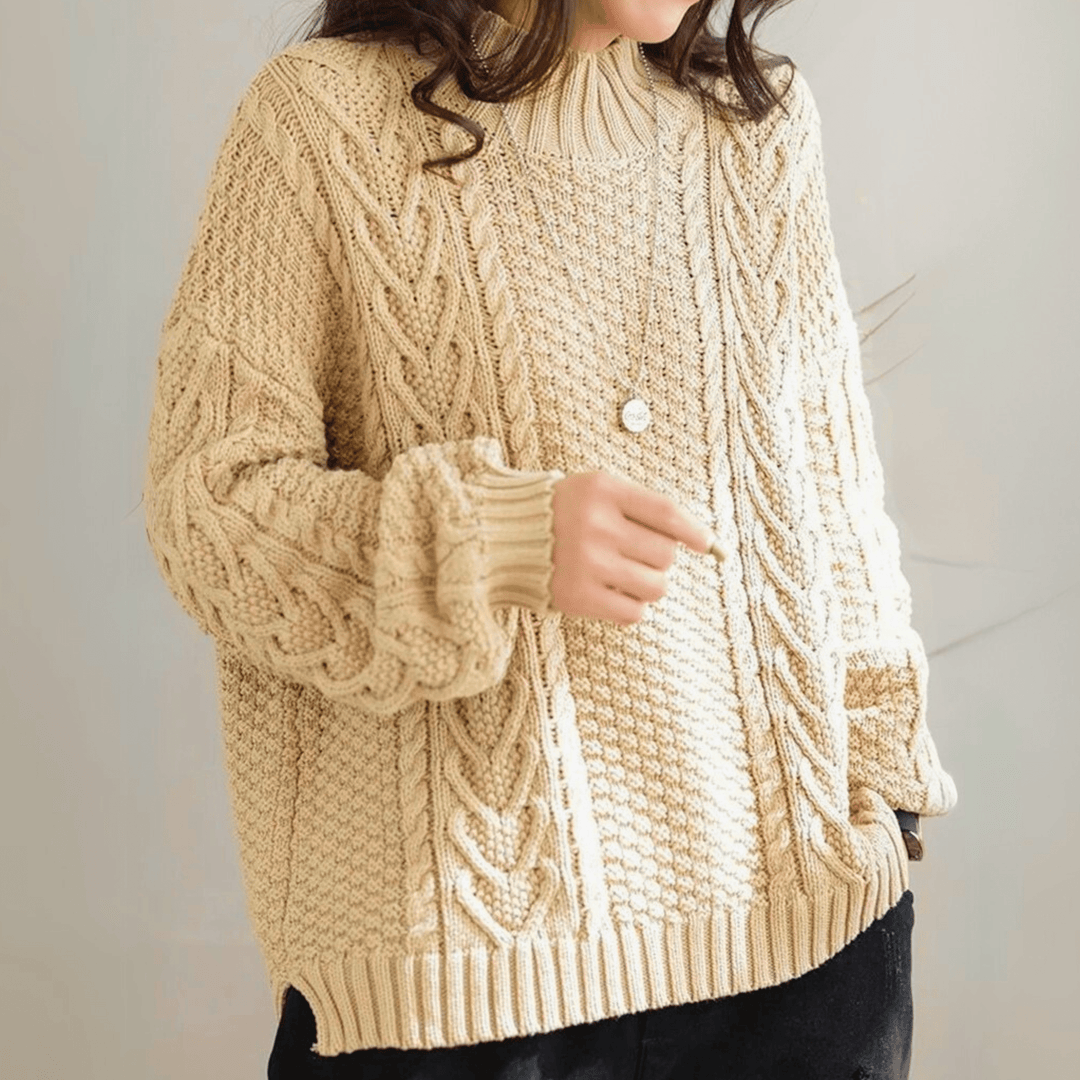 Gail - Women's chunky cable knit mock neck jumper in Sand – front view