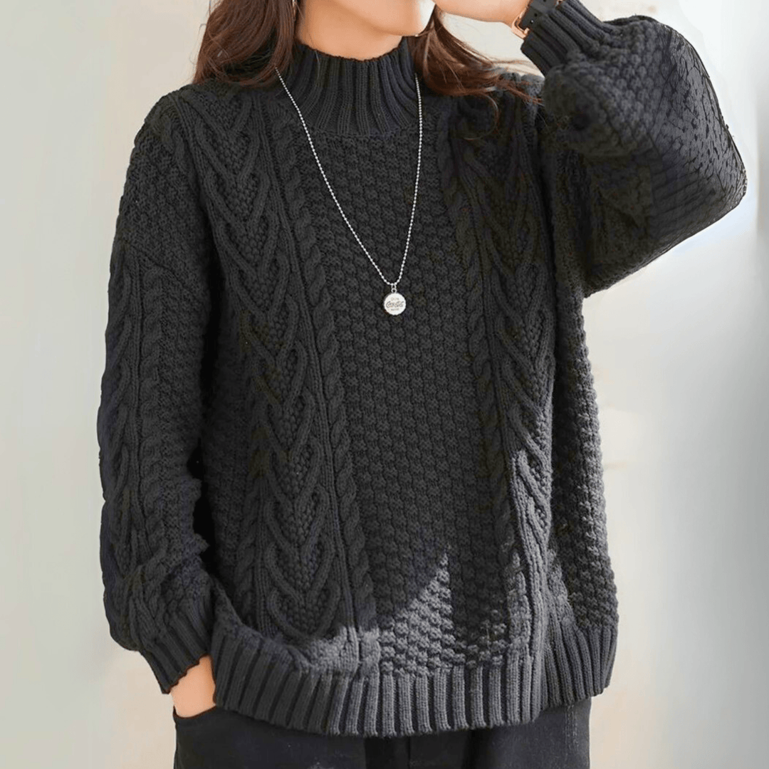 Gail - Women's chunky cable knit mock neck jumper in Black – front view