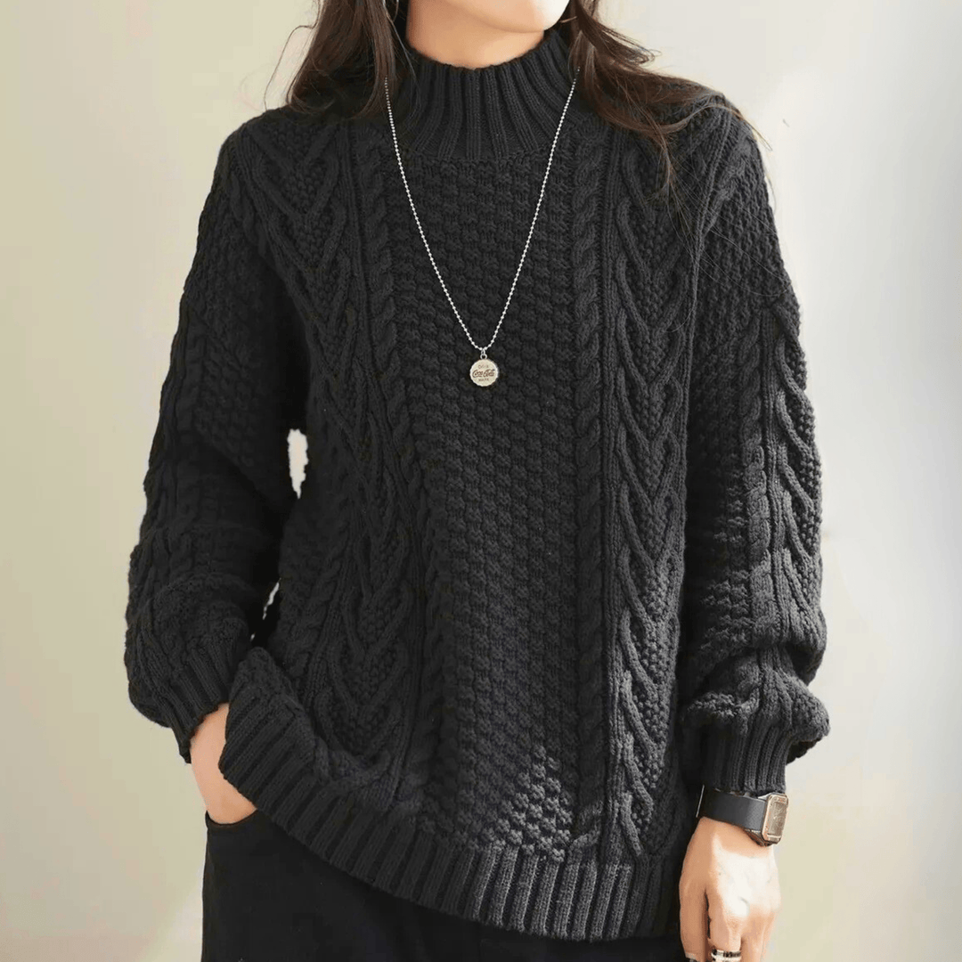 Gail - Women's chunky cable knit mock neck jumper in Black – alternate front view