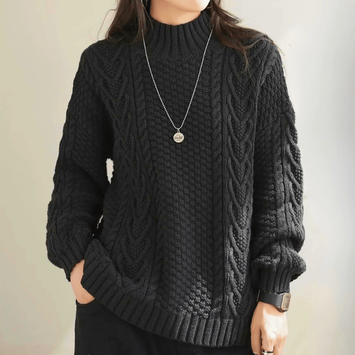 Gail - Women's chunky cable knit mock neck jumper in Black – alternate front view
