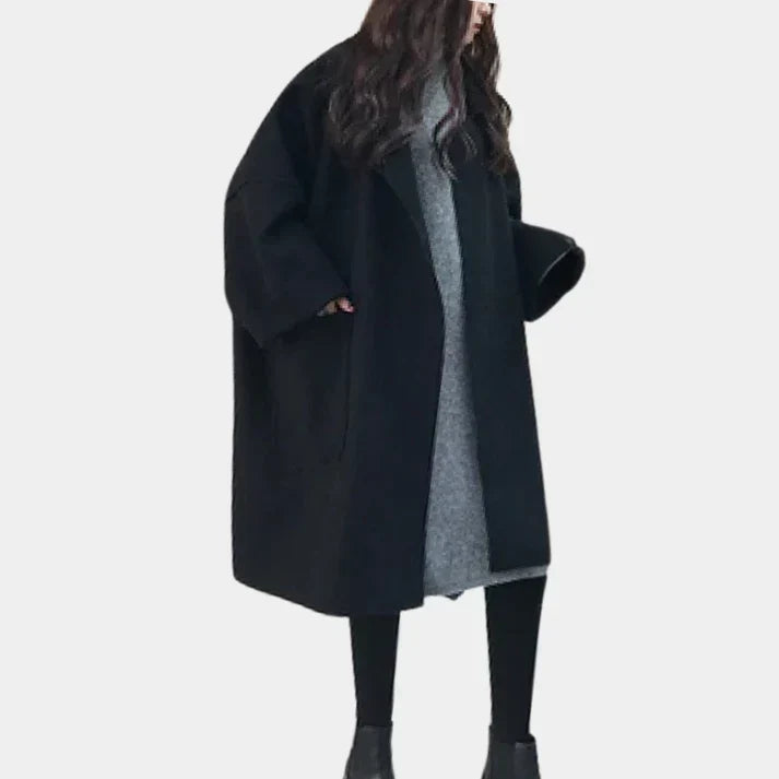 Women's oversized coat Hollie in Black – worn over grey dress