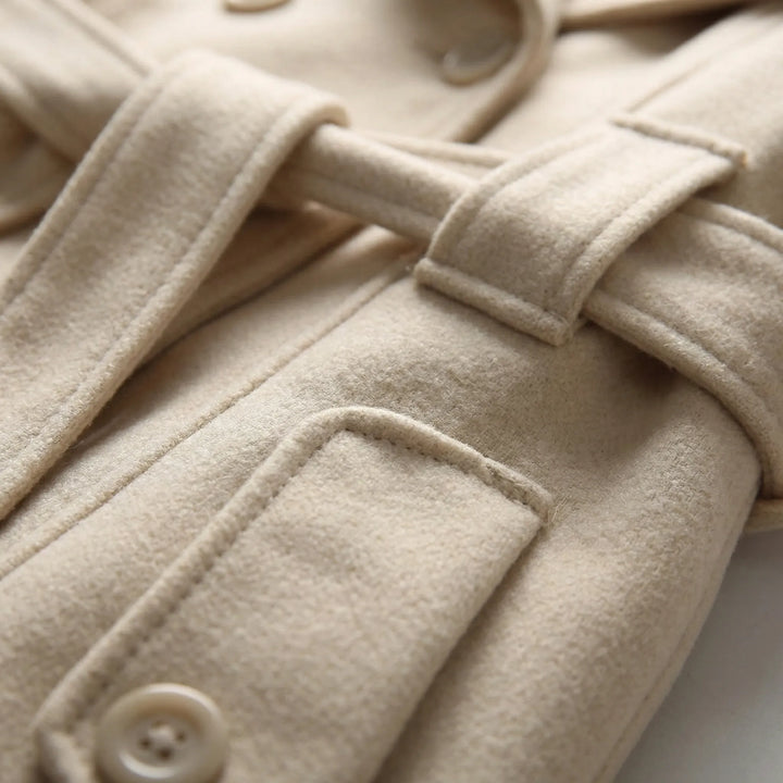 Women's hooded double breasted belted coat Carys in Beige – belt and pocket detail