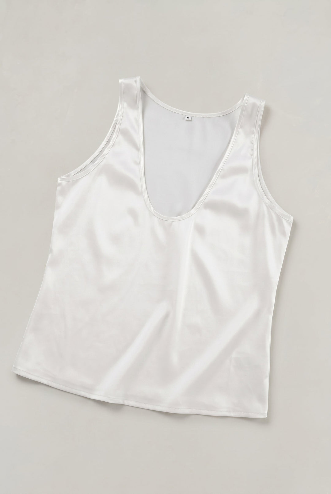 Isolde deep V-neck satin cami top in White – flat lay