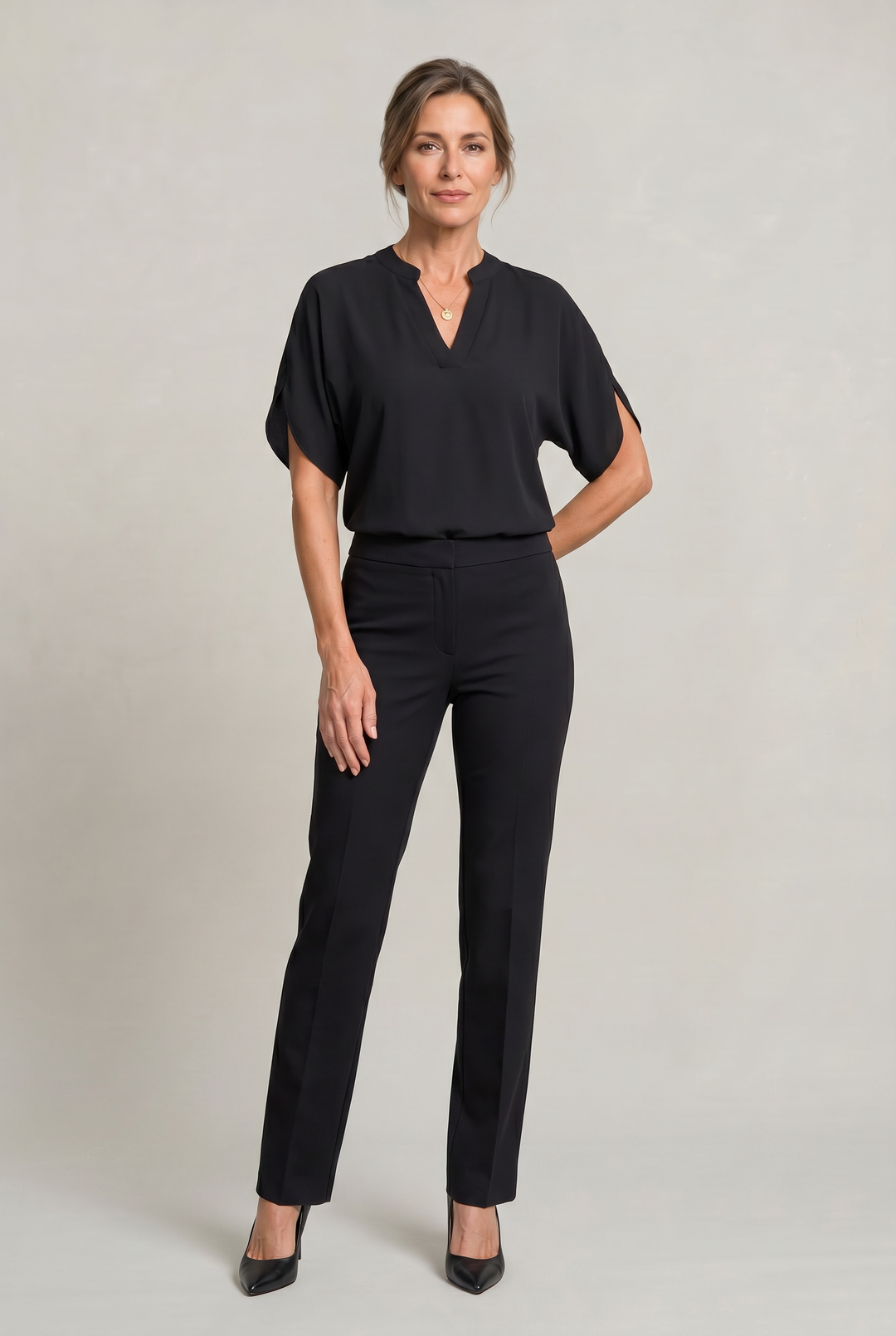 Rosalind notch V-neck petal sleeve top in Light Pink – worn by model