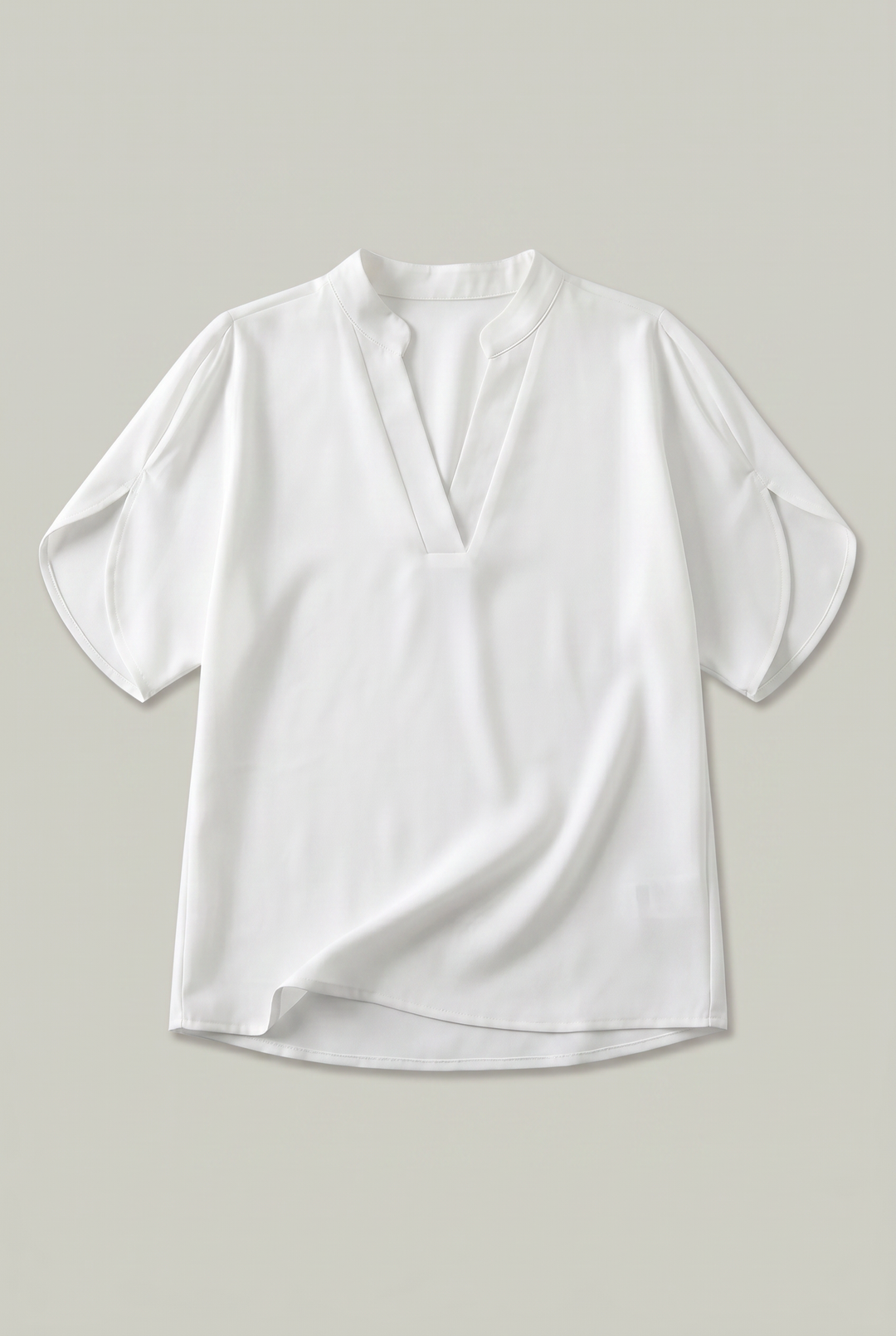 Rosalind notch V-neck petal sleeve top in White – flat lay
