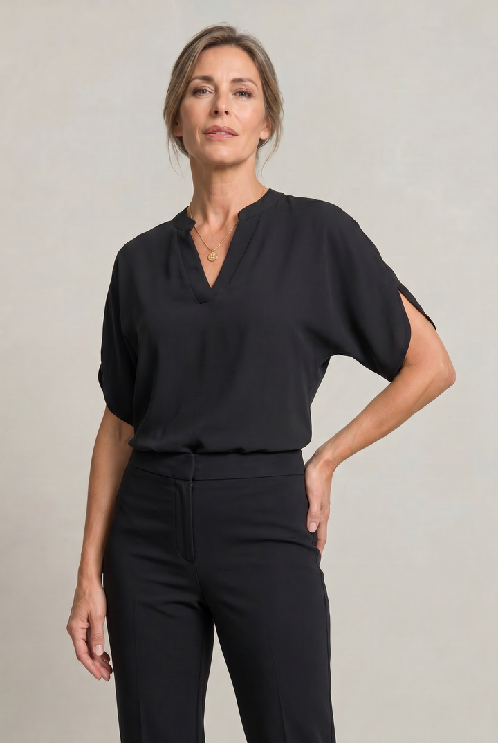 Rosalind notch V-neck petal sleeve top in Black – front view