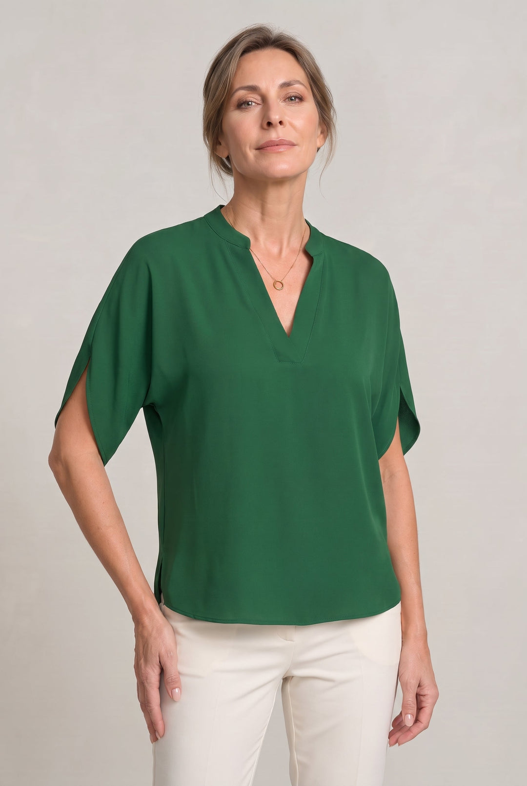 Rosalind notch V-neck petal sleeve top in Green – front view