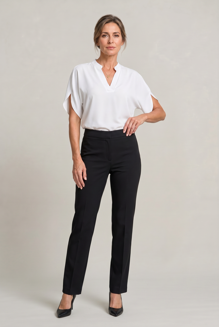 Rosalind notch V-neck petal sleeve top in White – full-length outfit