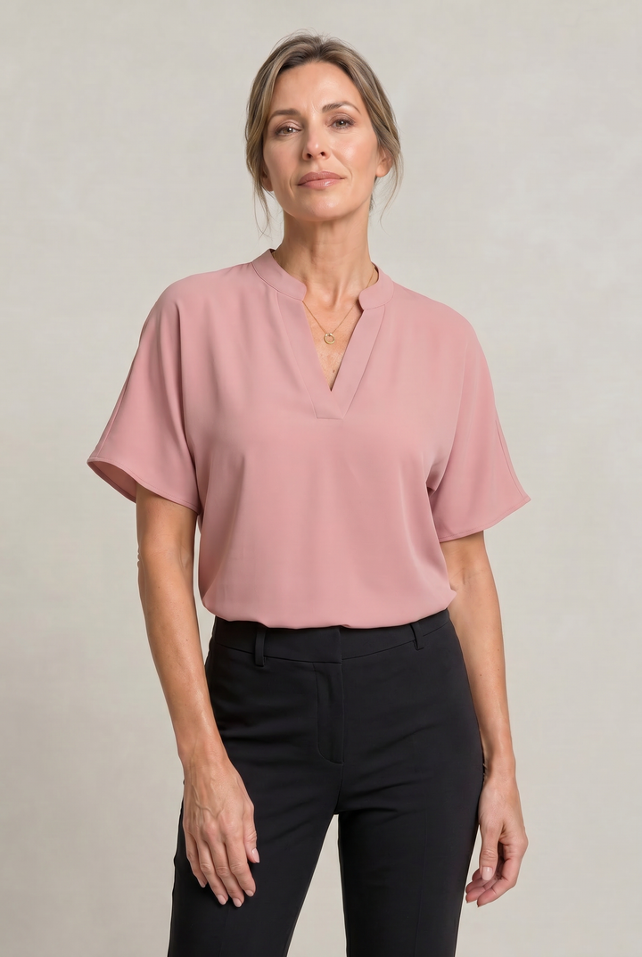 Rosalind notch V-neck petal sleeve top in Light Pink – front view