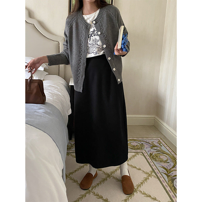 Women's cable knit cardigan Etta in Grey – styled with skirt