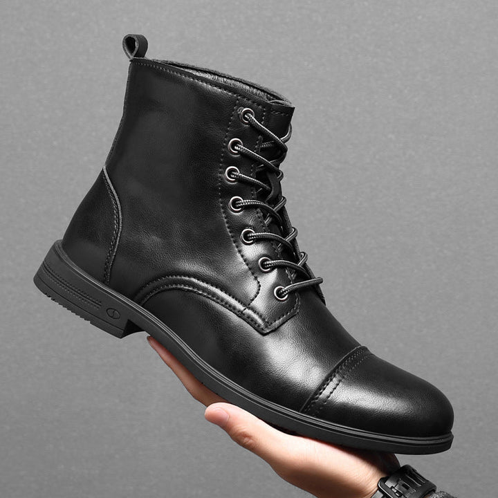 Men's toe-cap lace-up boots Christian in Deep Black – held in hand