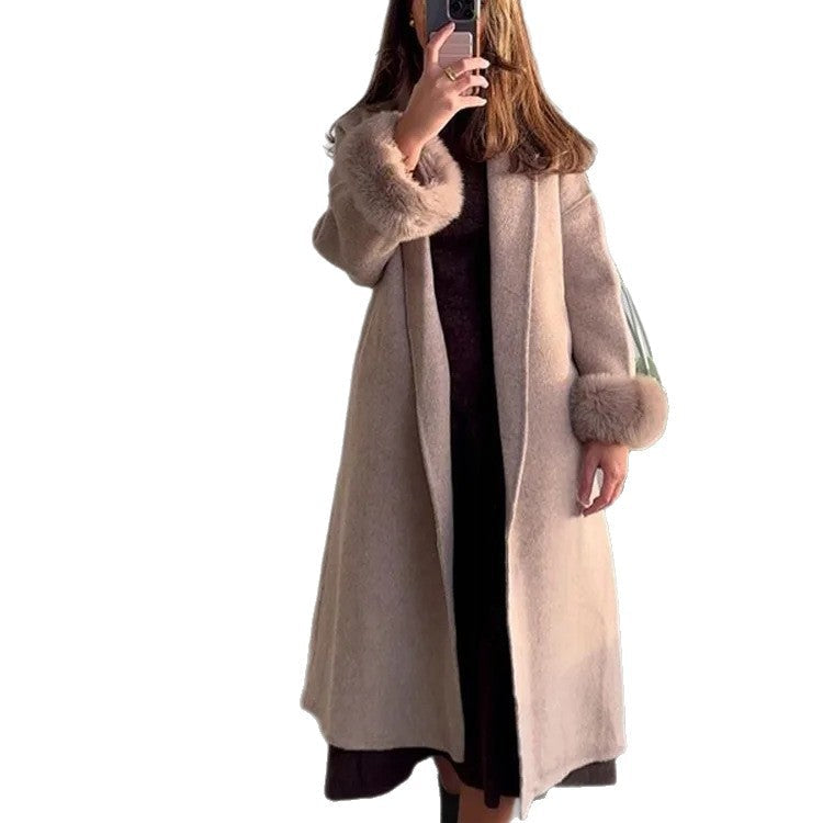 Women's long coat with faux fur cuffs Bridie in Apricot – worn open front