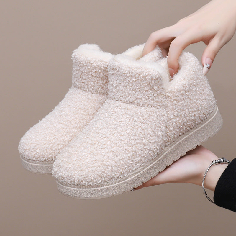 Women's slipper boots Sybil in Cream – held in hand