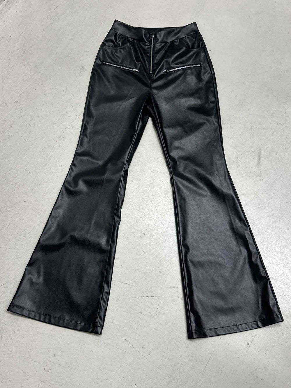 Women's faux leather flared trousers Felicia in Black – zip pocket style flat view