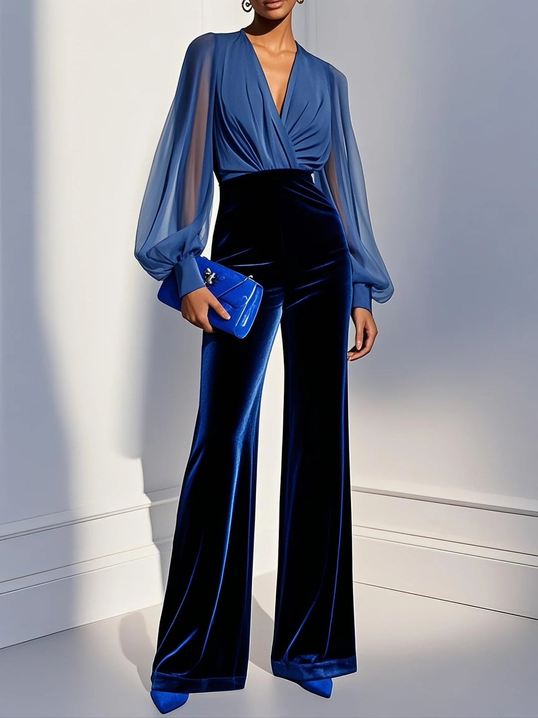 Clea mesh V-neck velvet jumpsuit in Blue – front view