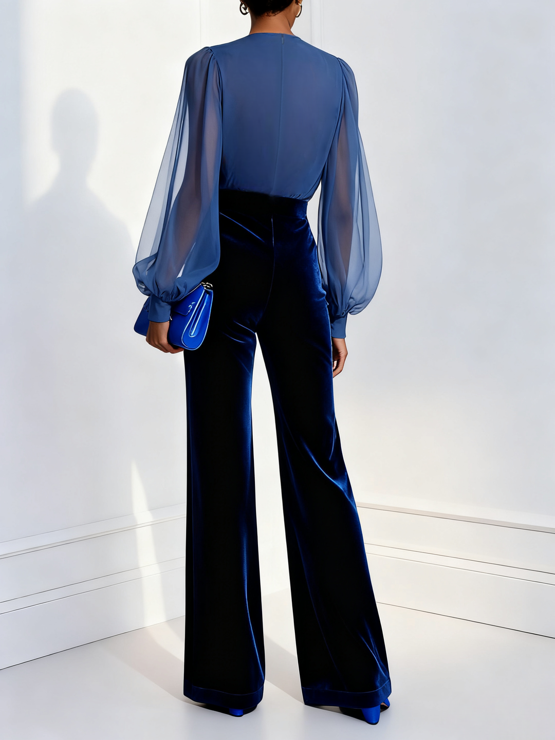 Clea mesh V-neck velvet jumpsuit in Blue – back view