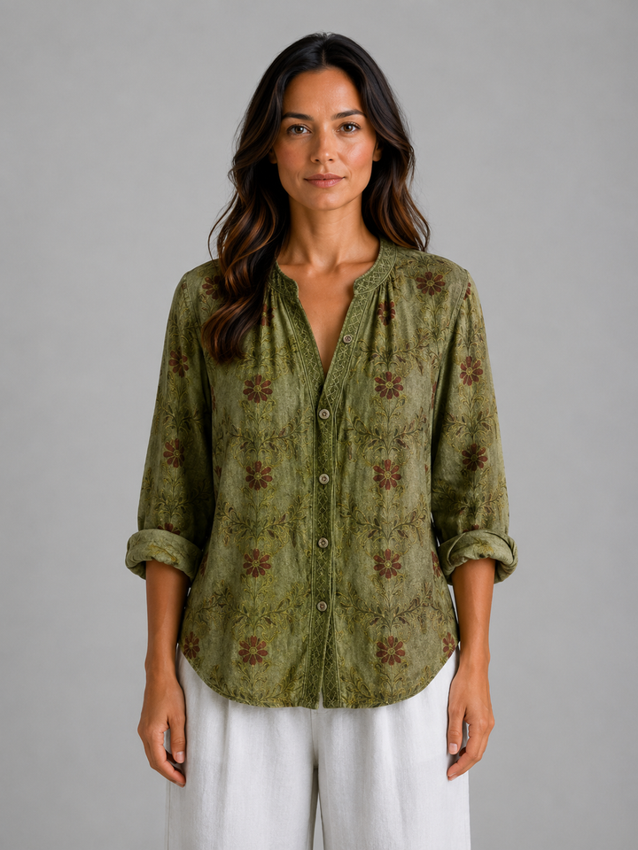 Marigold printed split-neck blouse in Green floral print – front view
