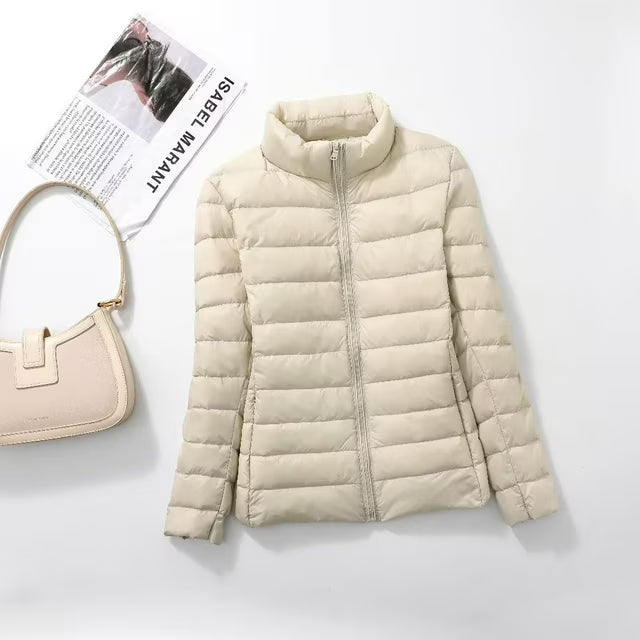 Marlborough women's quilted puffer jacket in Beige – flat lay