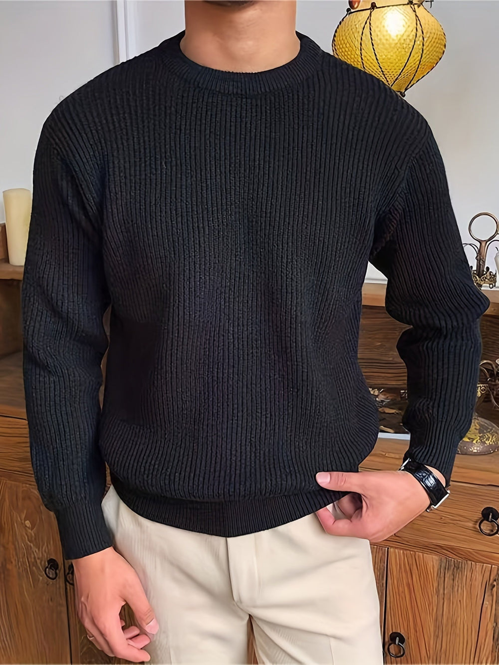 Men's ribbed crew neck jumper in black – Quinlan – front view hand at hem
