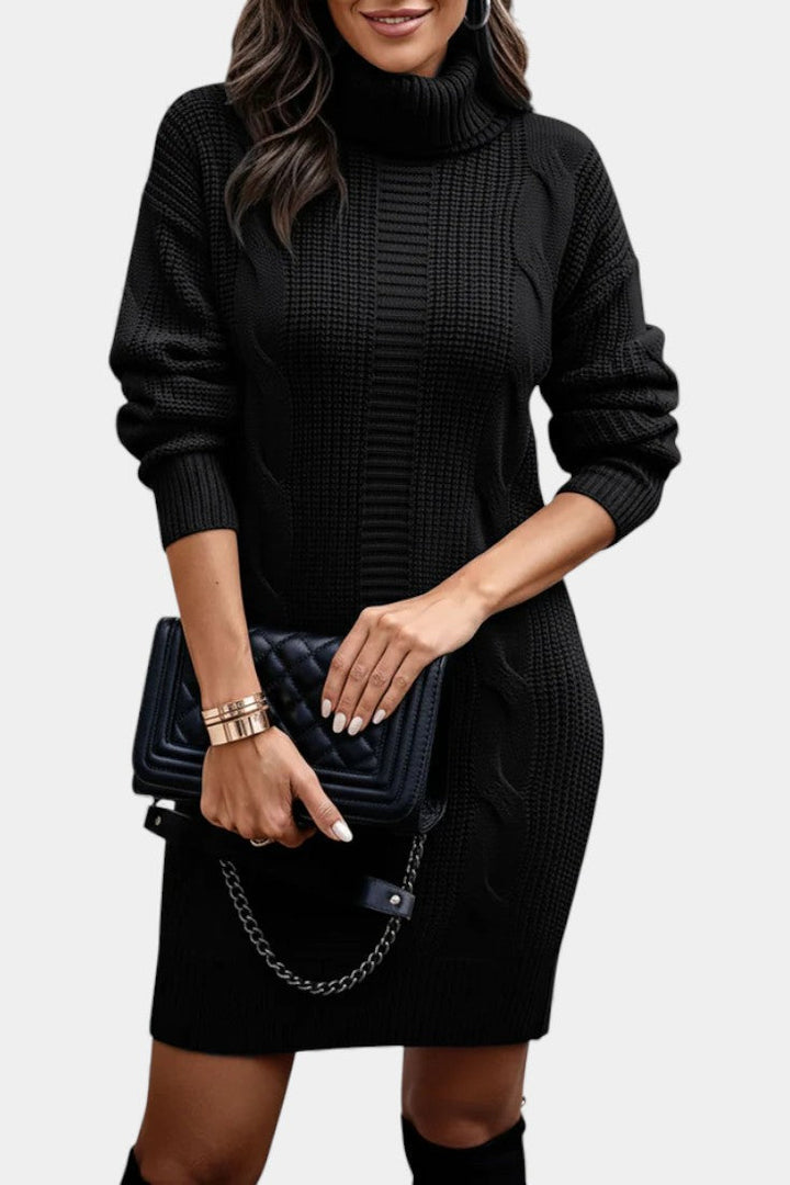 Women's roll neck jumper dress Peggy in Black – front view with bag