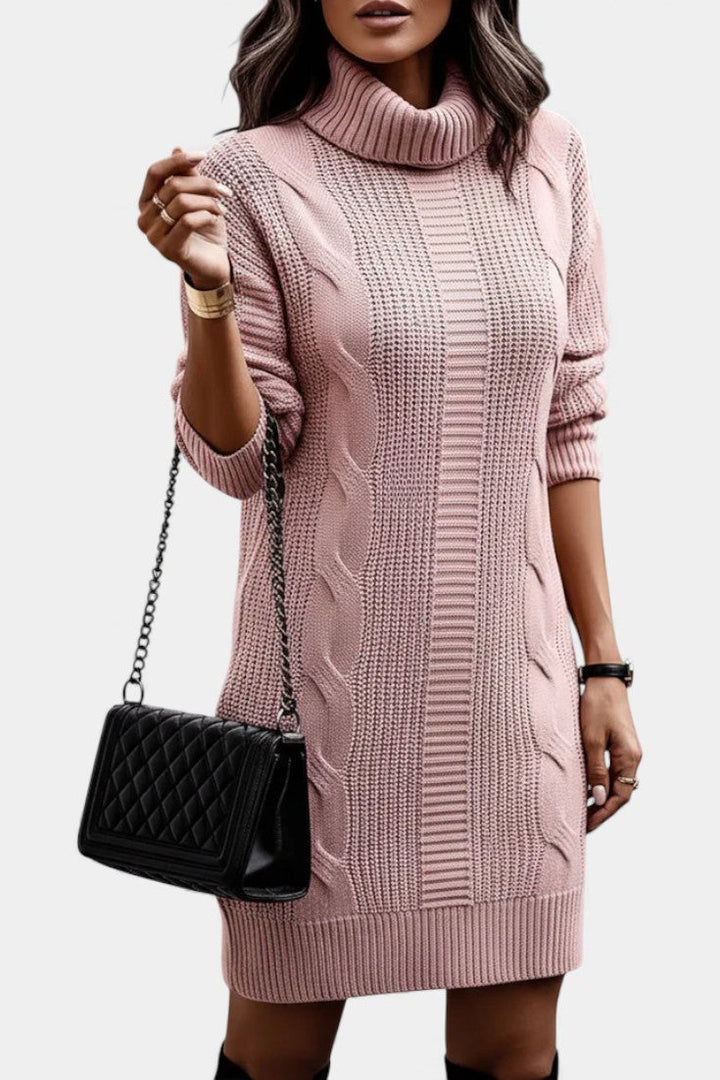 Women's roll neck jumper dress Peggy in Pink – holding bag