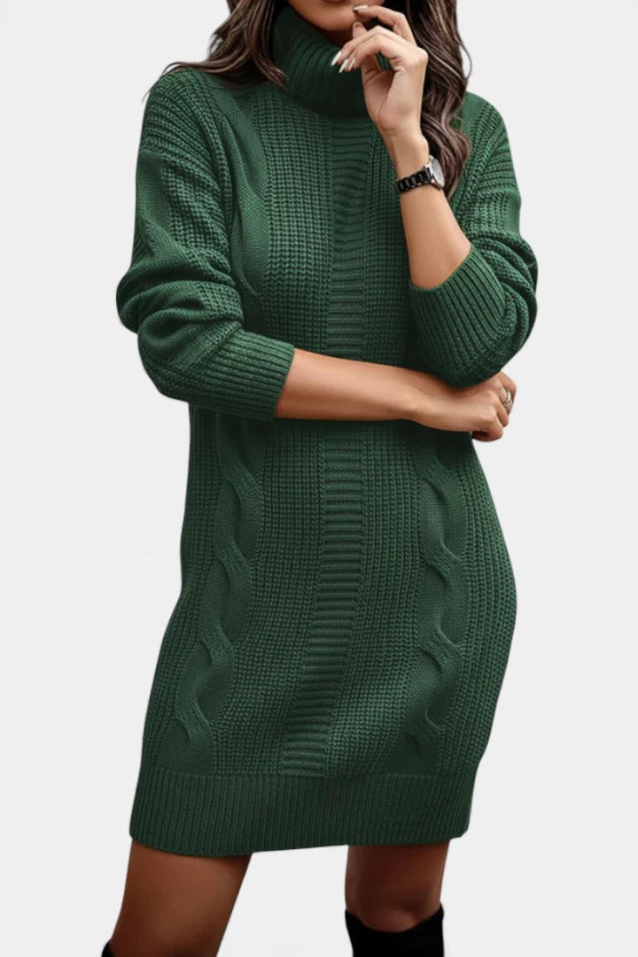Women's roll neck jumper dress Peggy in Dark Green – hands on waist