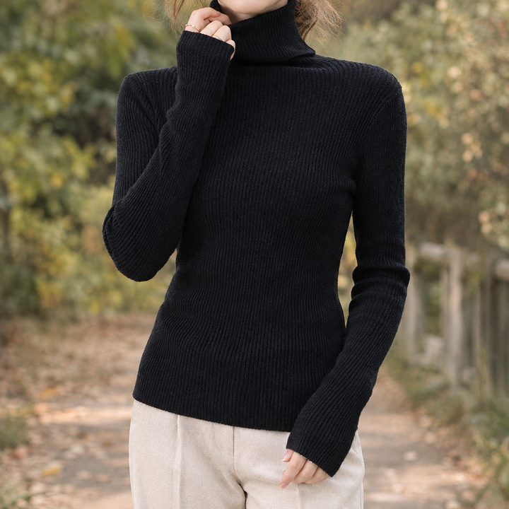 Carole - Women's ribbed roll neck jumper in Black – front view