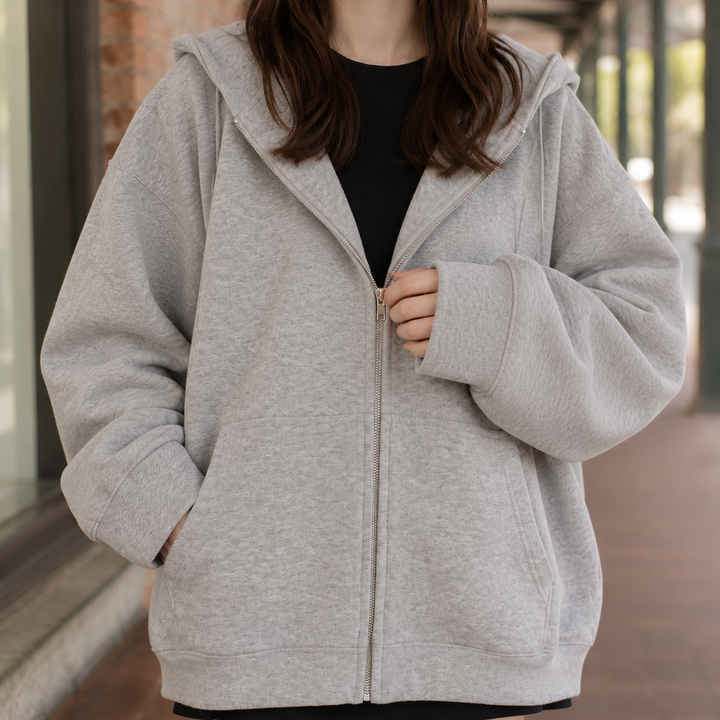 Elma - Women's zip-up hoodie in Grey – close-up front view