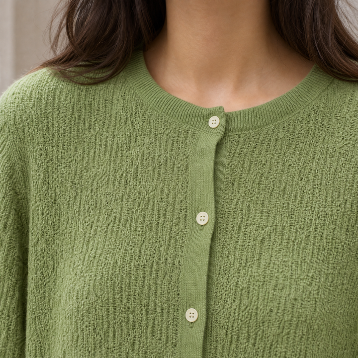 Keziah - Women's silk-wool cardigan in Green – close-up of texture and buttons