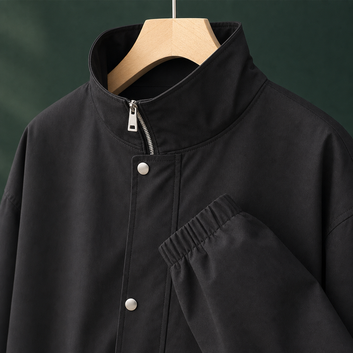 Carnoustie women's stand-collar jacket in Black – close-up of collar and zip
