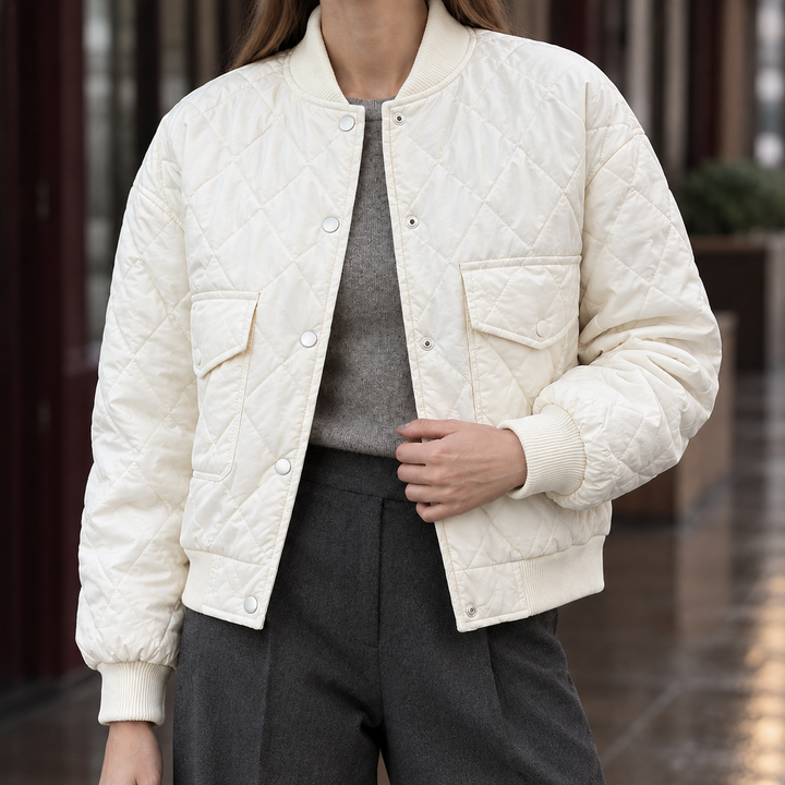 Charlbury women's quilted bomber jacket in Ivory – close-up front view