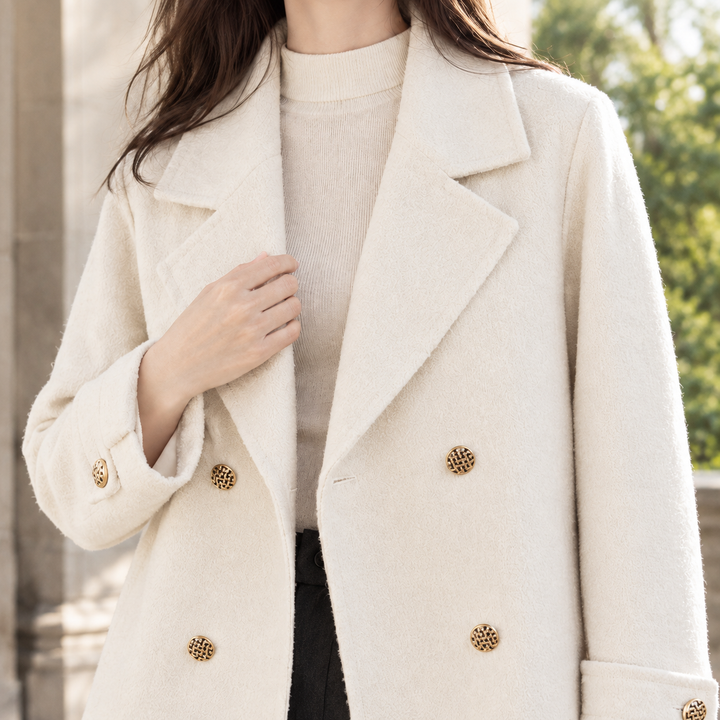 Sonning women's cropped jacket in Cream – close-up front view of lapels and buttons