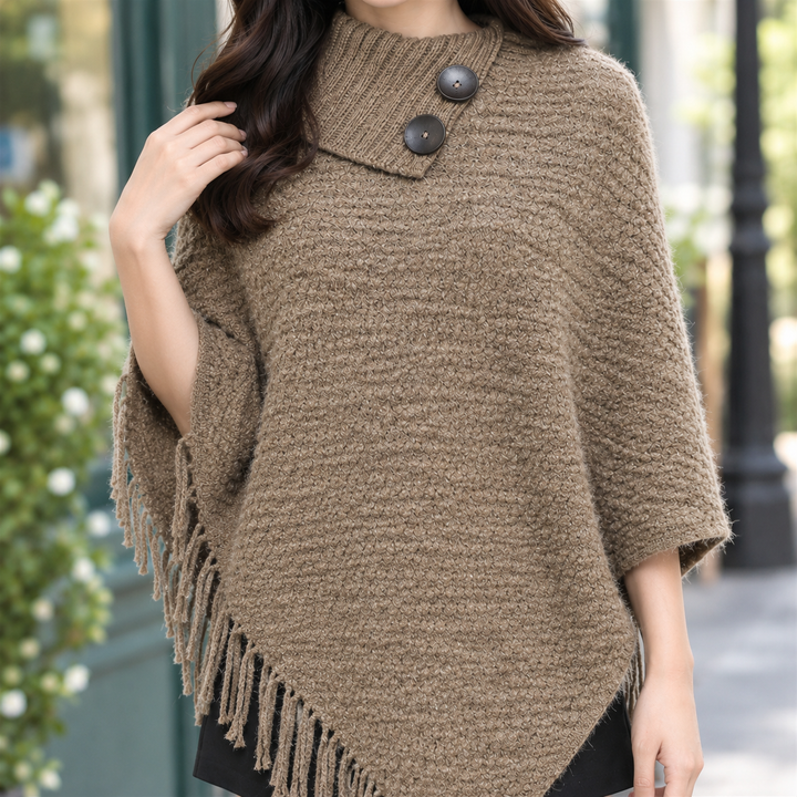 Lynette - Women's fringed knit poncho in Taupe – close-up of buttoned roll neck