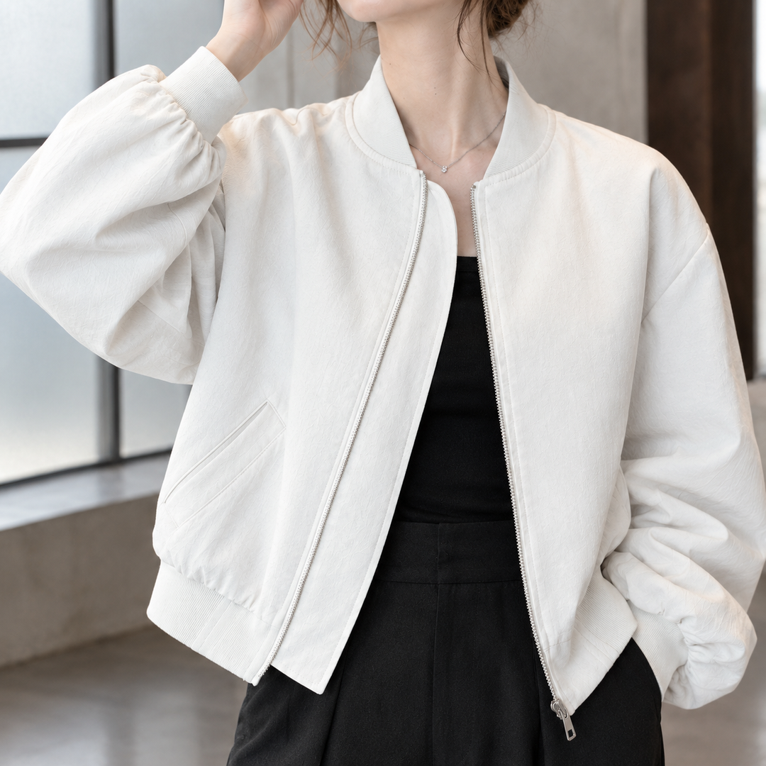 Tintagel women's cropped bomber jacket in White – ribbed collar and zip close-up