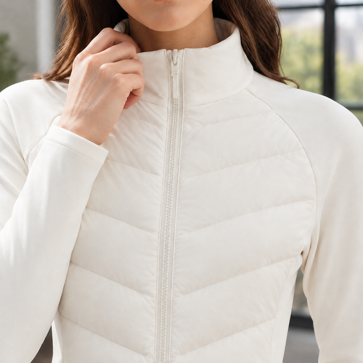 Cranbrook women's quilted jacket in Ivory – close-up of stand collar and quilting