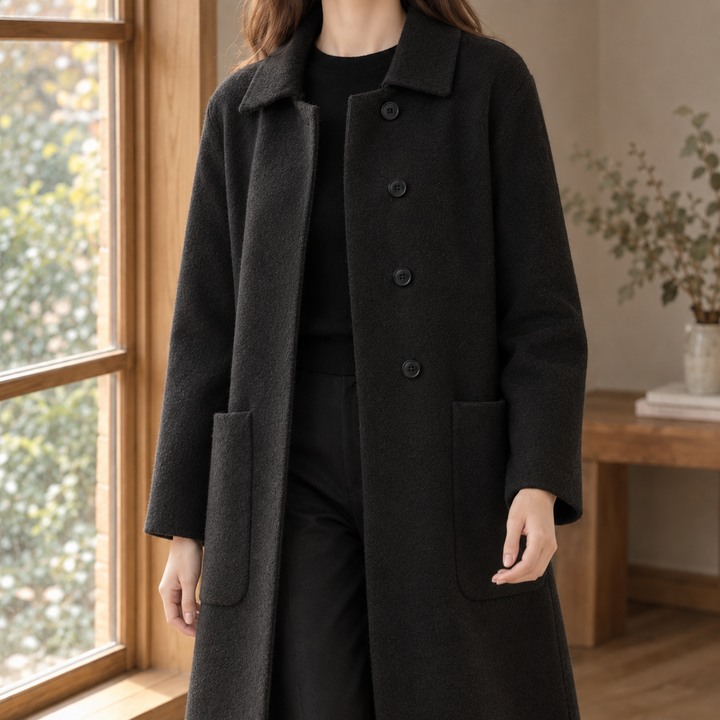 Lyme women's longline wool coat in Black – front view