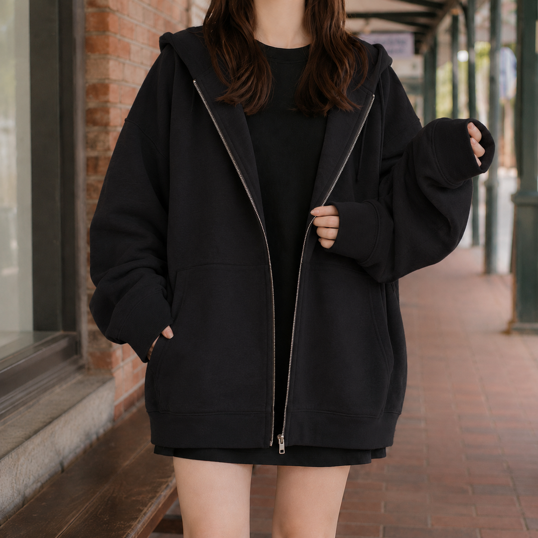 Elma - Women's zip-up hoodie in Black – front view